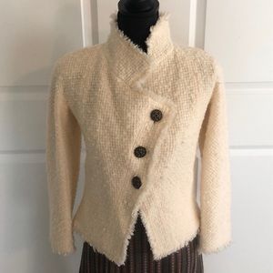 Off white woven wool blend Chanel jacket.